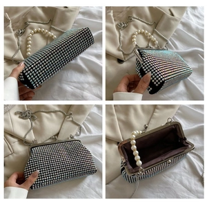 Detail view of rhinestone evening bag featuring pearl handle and rainbow crystal finish