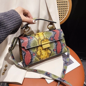 Chic multi-color snakeskin pattern crossbody bag with gold hardware and top handle