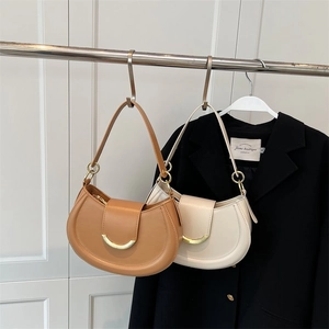 Classic crescent saddle shoulder bag with U-shaped gold buckle in brown and beige colors