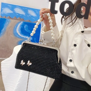 Elegant black rhinestone handbag with pearl handle and butterfly accents for women