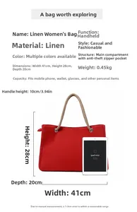 Detail view of red linen straw bag with iPad mini for scale and size reference