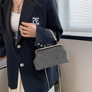 Elegant silver beaded evening shell clutch with pearl handle and metal chain strap