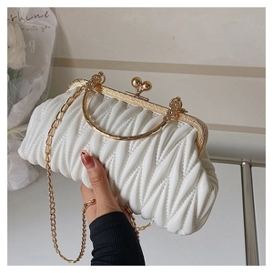White ruched evening bag with gold circular handle and fine metal chain detail