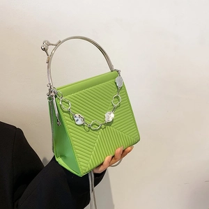 French style bright green handbag with linear embossing and silver metal ring handle