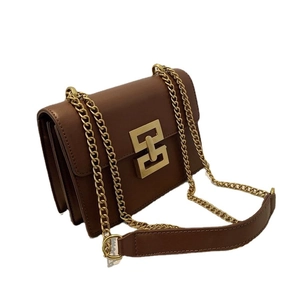 Brown leather crossbody bag with golden geometric clasp and chain shoulder strap