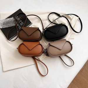Vintage PU Leather Oval Crossbody Bag French Style Underarm Shoulder Bag With Triangle Flap Contrast Stitching Minimalist Women