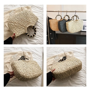 Detailed views of handmade woven straw handbag with unique beaded wooden handles