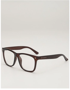Detailed side view of vintage amber-toned square frames with silver rivet accents