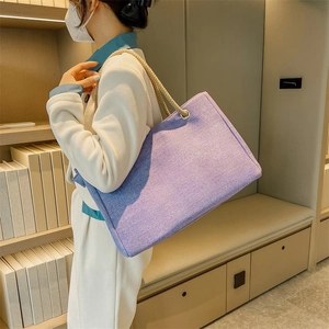 Lavender purple canvas tote bag with thick cotton rope handles for casual shoulder wear