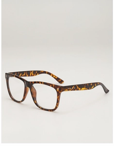 Detail of tortoise shell square glasses frame with metallic studs on the side