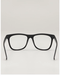 Front view of black square eyeglass frames with vintage rice nail studs on a plain background