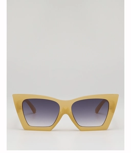 Front view of cat-eye sunglasses with translucent beige frame and purple gradient lenses