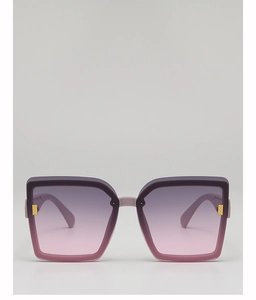 Détail des verres dégradés violets et décorations dorées sur les lunettes de soleil mode