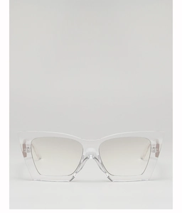 Detailed view of transparent cat eye sunglasses with silver metal hinges and clear frames