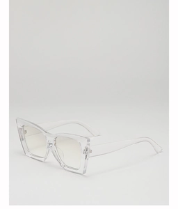 Detail view of transparent jelly color small frame sunglasses with cat-eye design