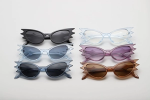 Multiple colors of bat-shaped hip-hop sunglasses with unique wing frame design