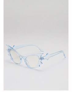 Detailed side view of light blue transparent bat-shaped sunglasses with sharp edges
