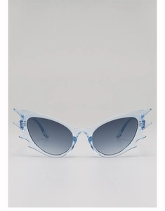 Detail view of the sharp bat-shaped light blue frame and gradient lenses on these sunglasses