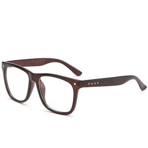 Retro square translucent brown glasses with stylish metal rivets on a white background