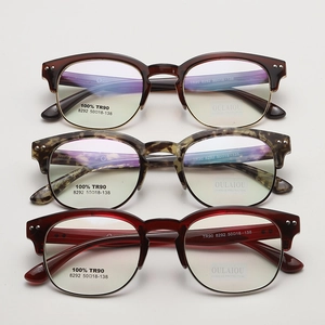 Close-up of TR90 and metal browline glasses frames in various tortoise and amber colors
