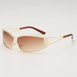 Retro futuristic metal cutout sunglasses with gold frames and brown gradient lenses