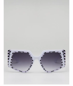 Detail of square oversized white sunglasses with purple checkerboard pattern and gradient lens