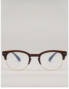 Detail of retro clubmaster frames with dark brown top and polished gold metal rim