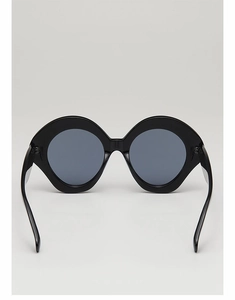 Detail view showing the inner frame structure of vintage oversized round sunglasses