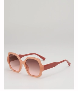 Detail of pink geometric oversized hexagonal sunglasses with gradient lenses