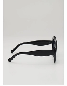 Detailed side view of black vintage sunglasses with wide temples and durable hinges