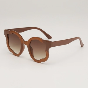 Fashionable brown wave-shaped sunglasses with gradient lenses and irregular floral frame