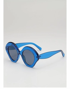 Detail view of translucent blue oversized round sunglasses with dark grey lenses