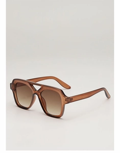 Detail of vintage square pilot sunglasses with translucent brown frames and gradient lenses