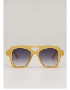 Detail view of yellow translucent square frames with gray gradient lenses and dual bridge