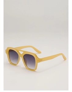 Macro detail of retro rectangular sunglasses with cream frames and purple gradient lenses