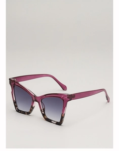 Side view of cat-eye sunglasses featuring purple resin frame and tortoiseshell accents
