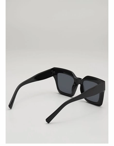 Detail view of the thick black frame and temple curve of these retro punk sunglasses