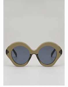 Close-up of olive green translucent geometric frame sunglasses with dark grey lenses
