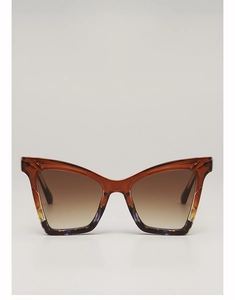Detailed view of amber cat-eye sunglasses with gradient purple and yellow frame accents