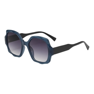 Oversized geometric dark blue sunglasses with grey gradient lenses and thick black temples
