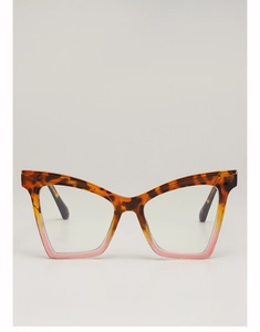 Detail view of cat eye frame with tortoiseshell top and transparent pink bottom