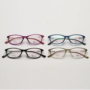 Close-up of four TR90 square eyeglass frames in black, blue, purple, and olive green