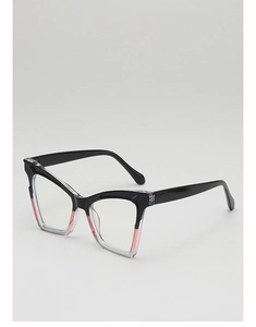 Detail of cat-eye sunglasses with black to pink gradient frame and high-quality finish
