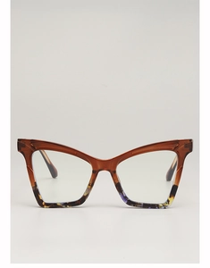 Detail of cat-eye sunglasses with transparent tea upper and tortoiseshell texture frame