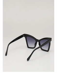 Detail showing high-gloss resin cat eye frame and interior size specs engraving