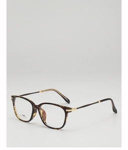Detail view of tortoiseshell TR90 glasses frame with metallic hinge and square lens design