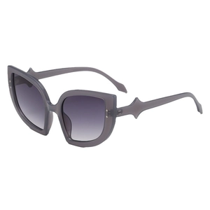 Occhiali da sole cat-eye grigi traslucidi oversize con lenti sfumate alla moda