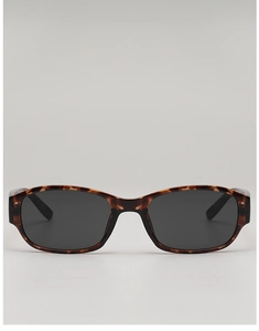 Detailed view of tortoise shell patterned rectangular sunglasses with dark lenses