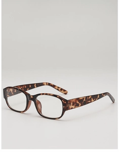 Detailed side view of leopard print square sunglasses with tortoise shell texture frames