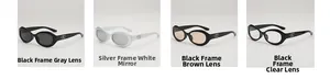 Vue détaillée de lunettes de soleil ovales avec détails en métal en forme de cœur